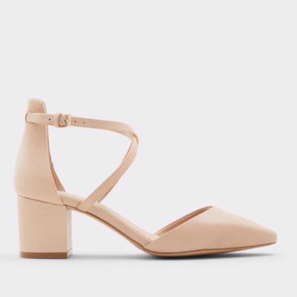 Wide width bone colored Aldo Heels.